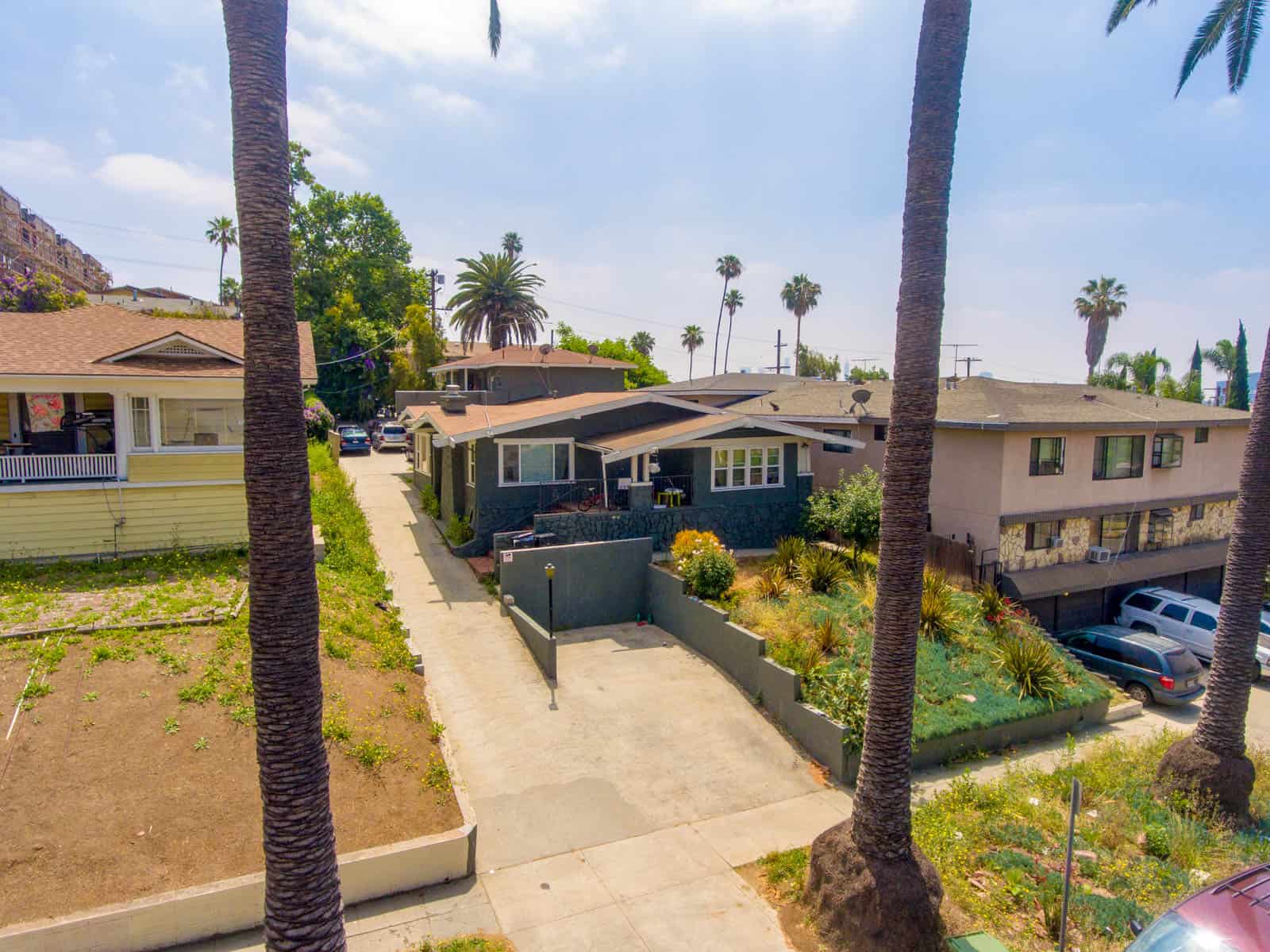 aerial drone photo of apartment community in Corona, CA with swimming pool in foreground